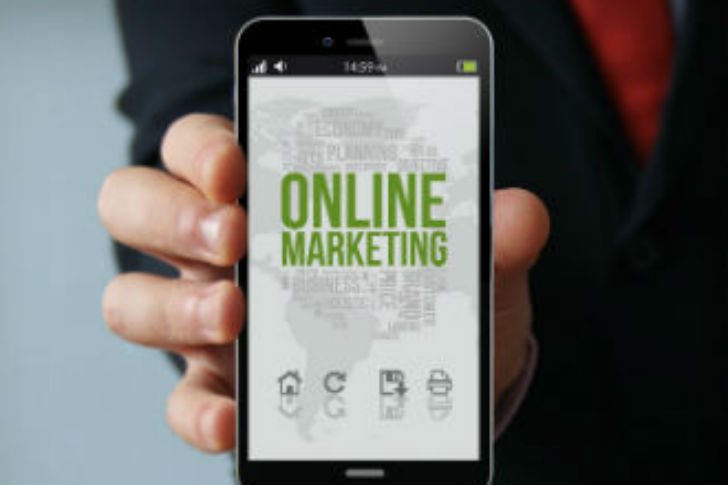 Man holding online marketing phone