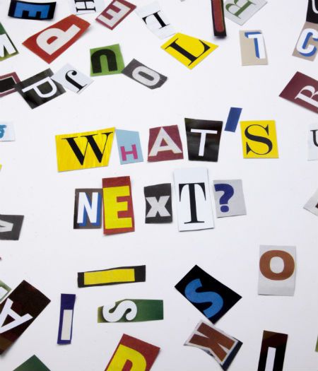Website design magazine cut outs spelling out whats next