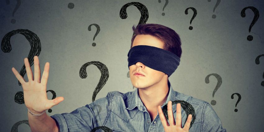 Blindfolded man looking for the right content strategy.